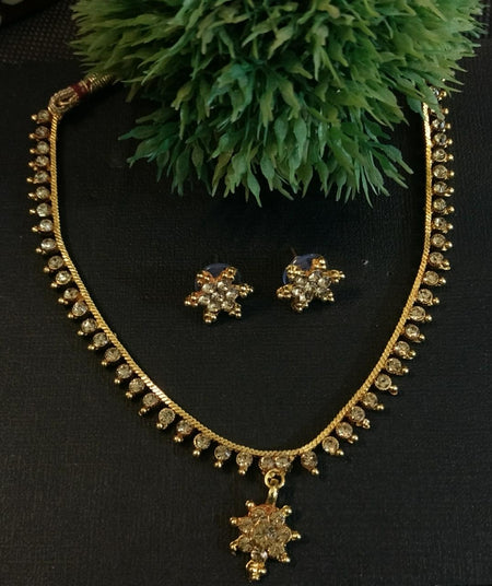 Golden stone necklace
