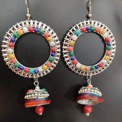 Metal  earrings with thread work