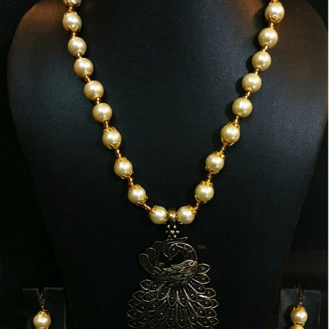 Antique golden peacock jewelry